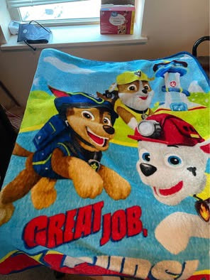 Paw Patrol cartoon design 40"W x 50"L Soft, warm and cuddly Great for travel or nap Fits twin size bed Paw